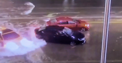 Lamborghini Huracan Spyder Not Impressed By Tropical Storm, Drives Through Flooded Road