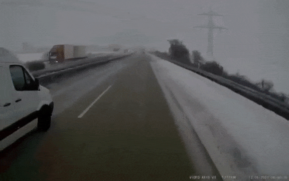 Van Driver Slides On Snow, Sends Truck Down An Embankment